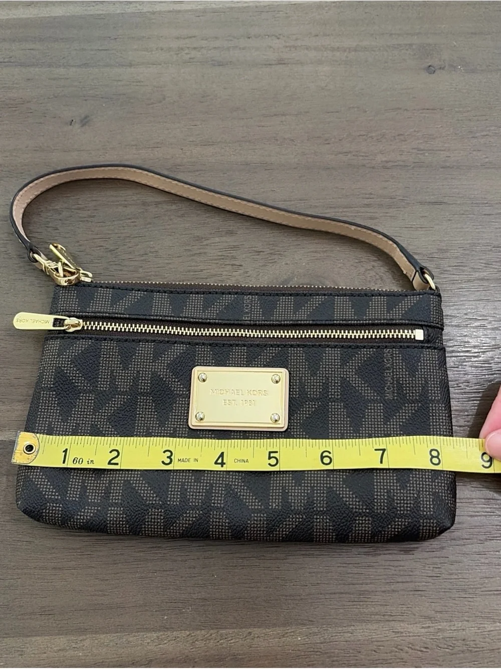 Michael Kors Brown and Tan MK Logo Wristlet with Gold Plate